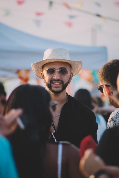 Friends enjoying at a summer music festival.