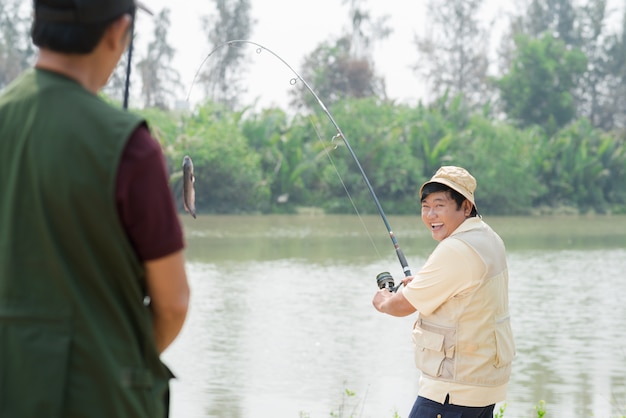 friends fishing