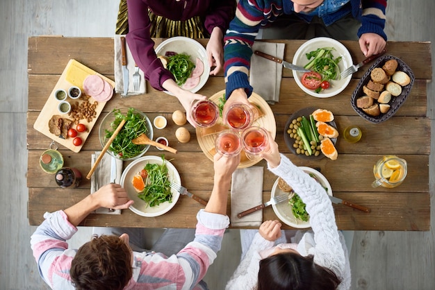 Friends Gathering at Dinner Table