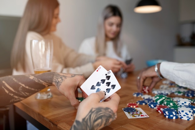 friends havinf fun while playing poker