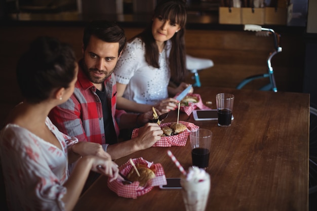 Friends having burger together