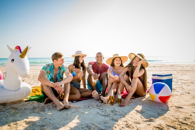 Friends having fun on the beach