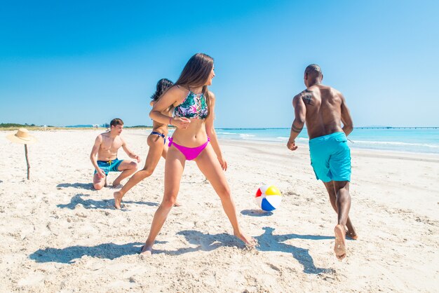 Friends having fun on the beach