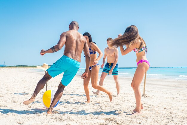 Friends having fun on the beach