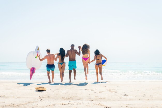 Friends having fun on the beach