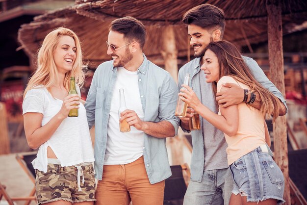 Friends having fun on the beach