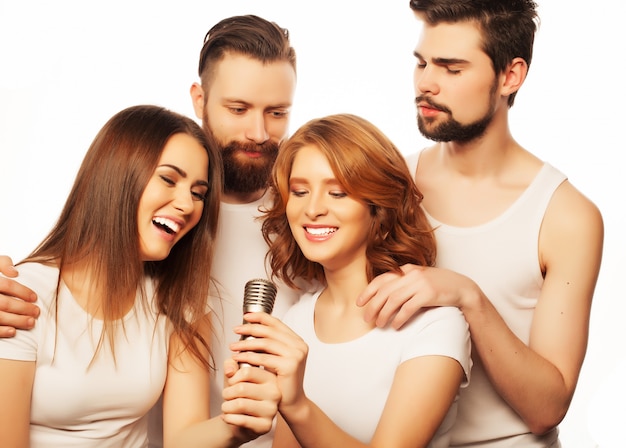 Friends  having fun at karaoke