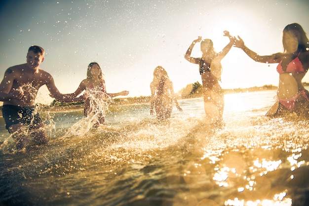 Friends having fun at the sea