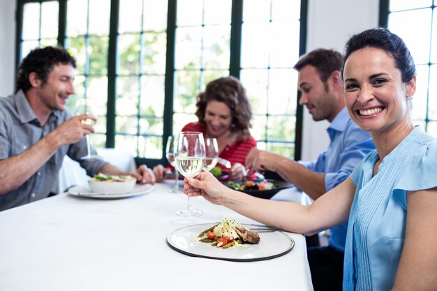 Friends having lunch in restaurant