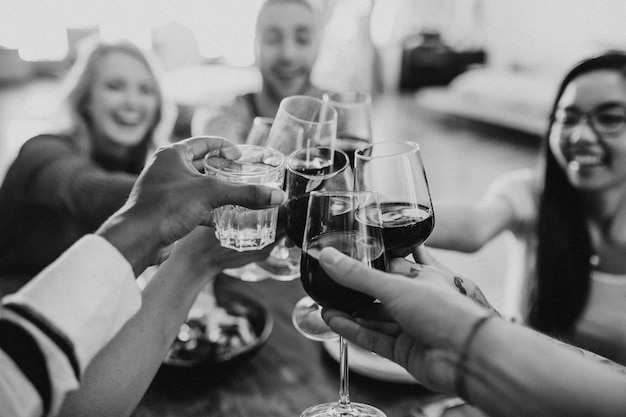 Friends making a toast at a dinner party