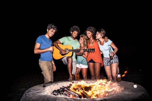 Friends partying on the beach