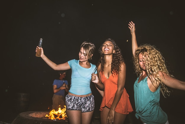 Friends partying on the beach