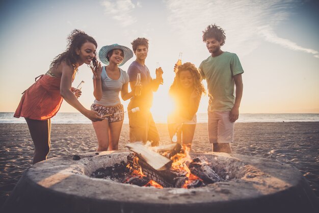 Friends partying on the beach