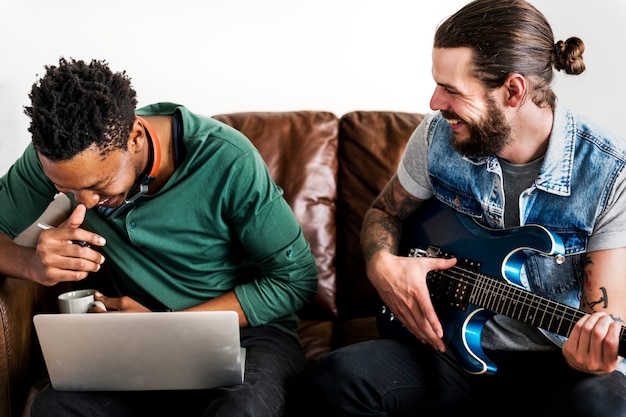 Friends playing music together