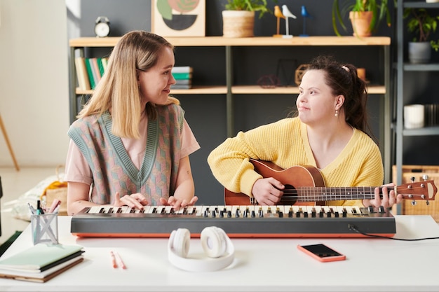 Friends Playing Musical Instruments At Home