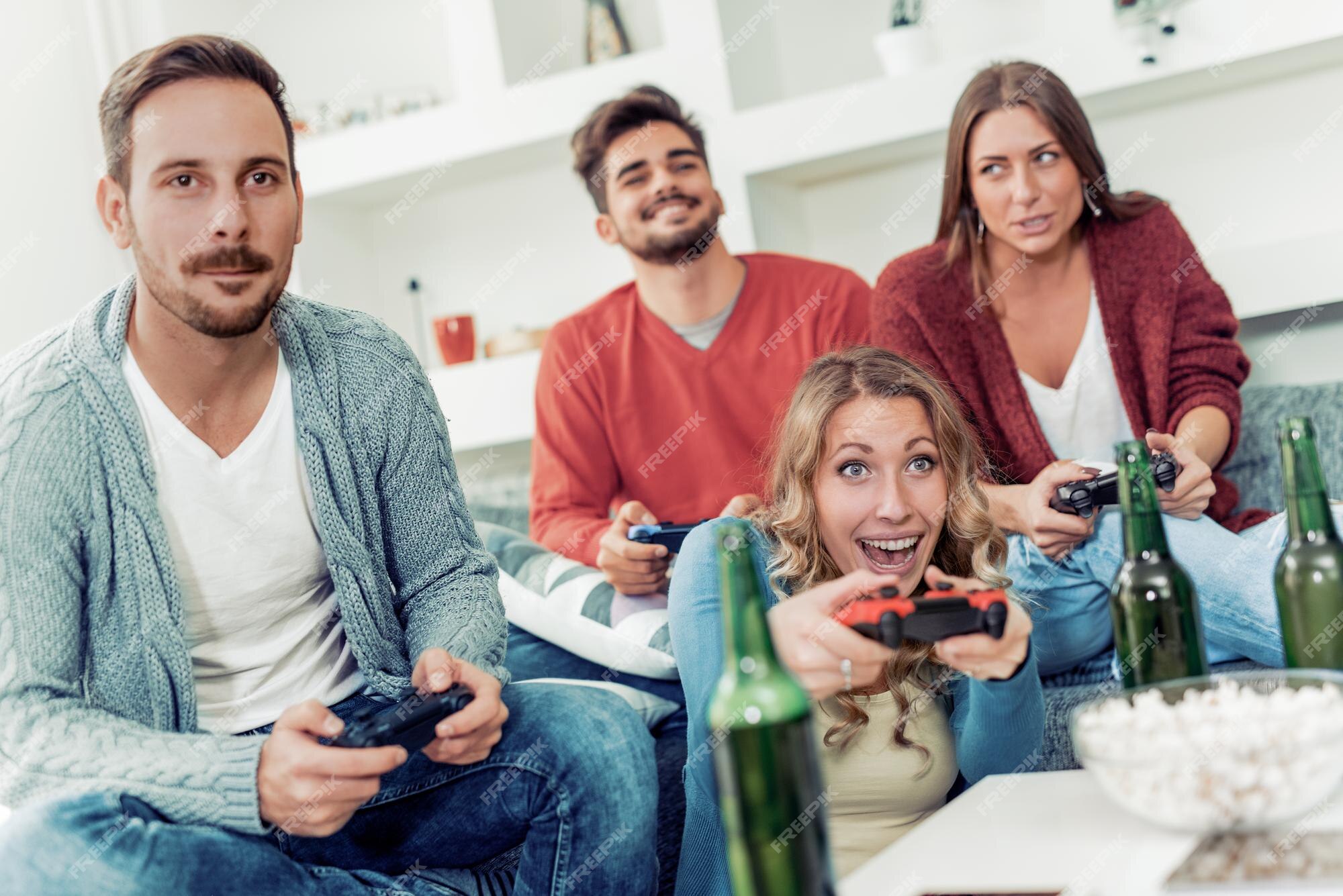 Premium Photo  Excited gamers friends playing video games at home