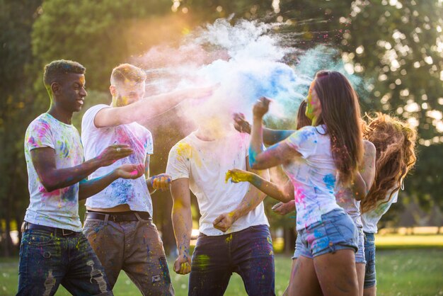 Friends playing with holi powder