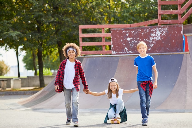 Friends riding on skateboard