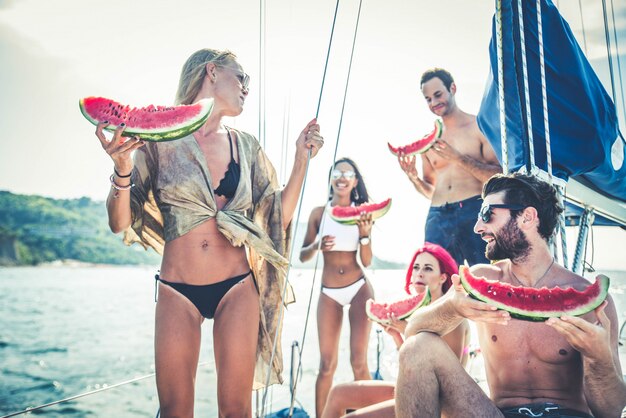 Friends on sailing boat