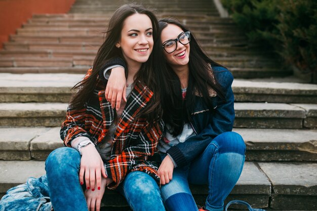 friends sitting on the stairs