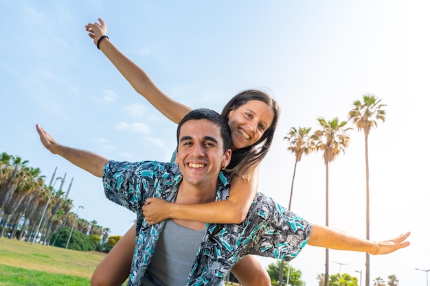 Friends smiling having fun outdoor in summer