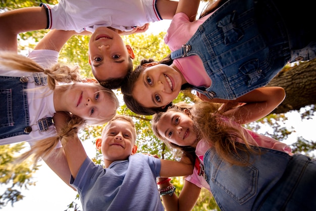 Friends smiling together in a circle