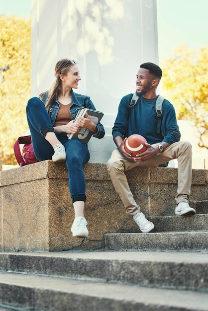 Friends students and bonding on university campus for studying education and knowledge Summer friendship and man and woman higher education people talking about school work and studies or sports