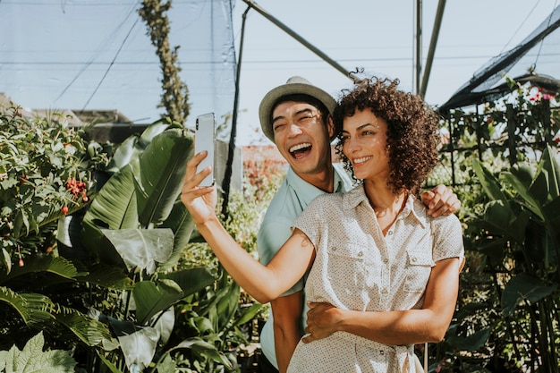 Friends taking a selfie at a garden