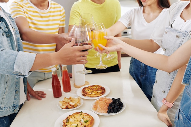 Friends toasting at party