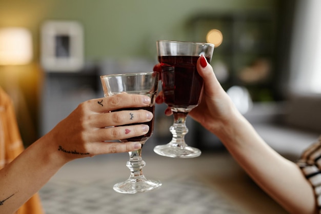 Friends toasting with red wine