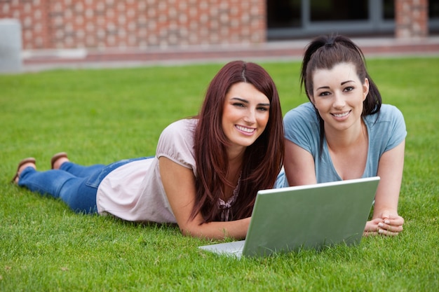 Friends using a notebook