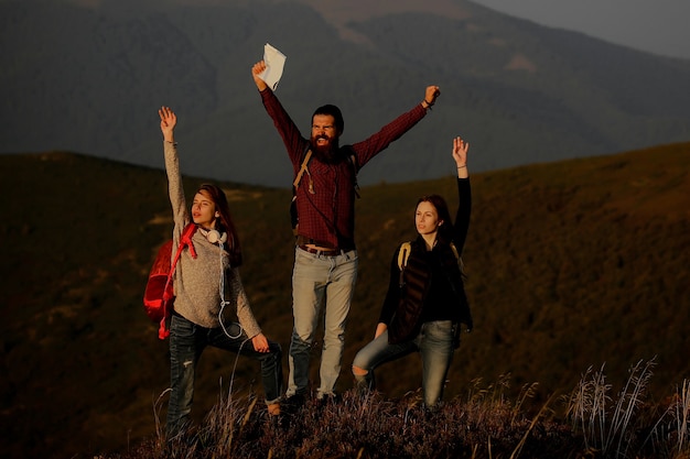 Friends walking on mountain