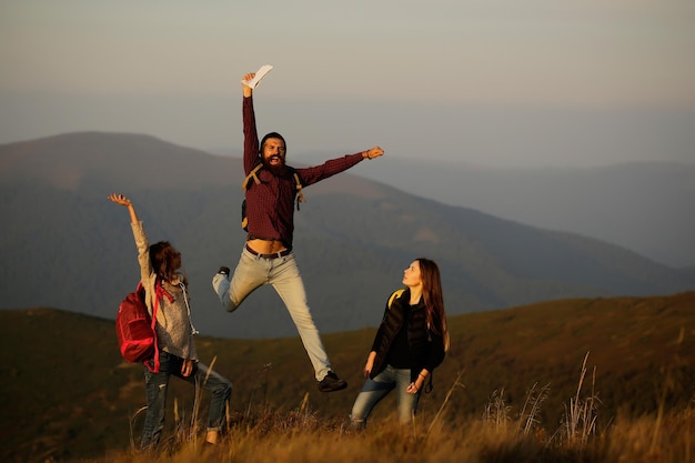 Friends walking on mountain