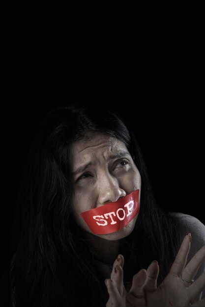 Photo frightened woman with word of stop