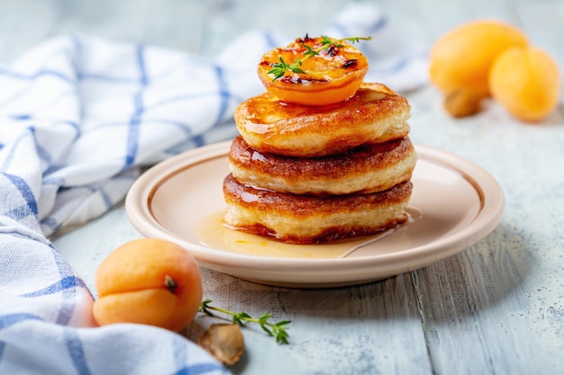 Fritters with apricot jam and thyme for breakfast