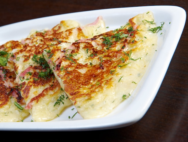 Fritters with Ham and herbs. close up