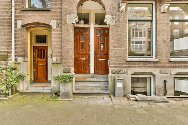 The front of a brick house with wooden doors