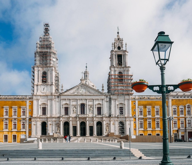 Front facade of the Royal Convent and Mafra Portugal National Palace constructed in baroque and neoclassic style