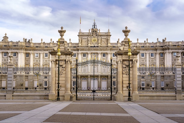 Front gate of the royal palace of Madrid, panoramic view of the building in its main facade. Spain.