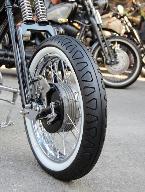 Front Part Of Old School Motorbike With White Side Tire