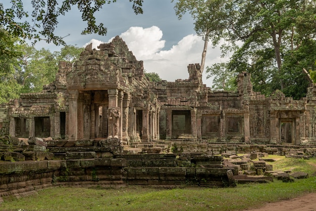 Front of preah khan framed by trees