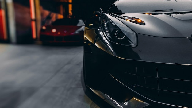 Front of a sports car  black and red car