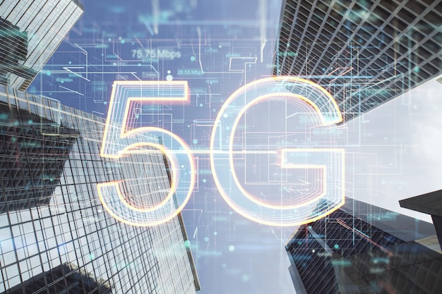 Front view on 5G digital glowing symbols on modern skyscraper tops background 5G network wireless internet connection and communication network concept double exposure