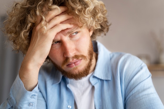 Front view anxious man at home