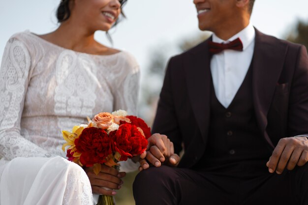 Photo front view beautiful couple at their wedding