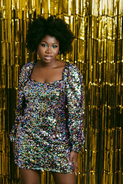 Front view black woman wearing sequins dress