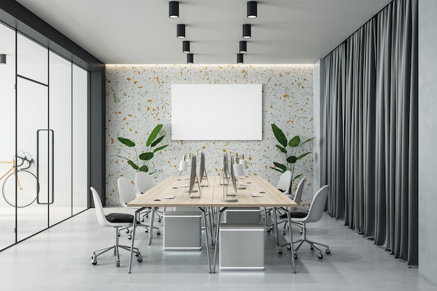 Front view on blank white poster with place for your logo or\
text on colorful wall in stylish board room with wooden conference\
table white chairs and transparent doors 3d rendering mockup