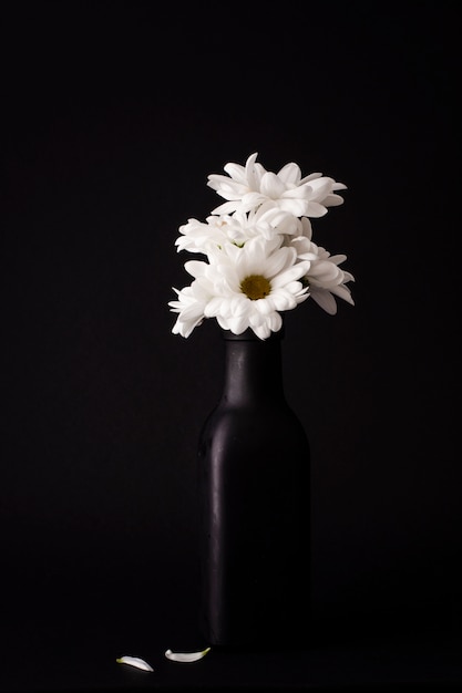 Front view blooming flowers in vase