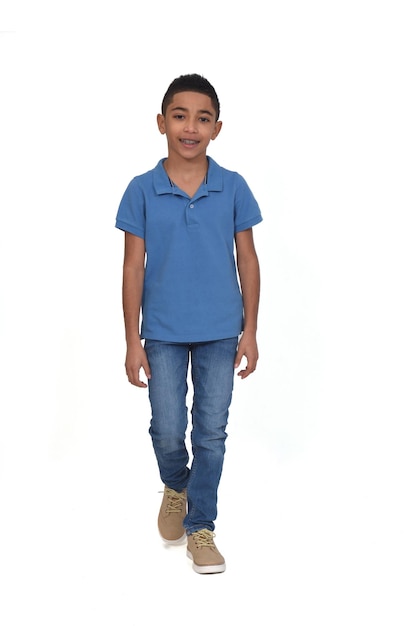 Front  view of boy walking on white background