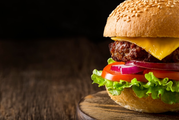 Front view burger on cutting board with copy-space